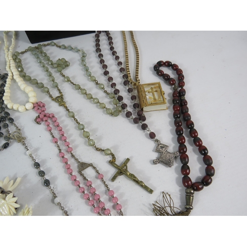 600 - Selection of bone carved jewellery and Rosary necklaces.