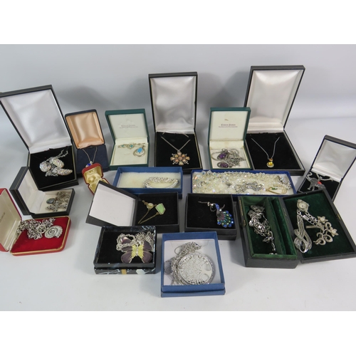 601 - Large selection of mainly silver toned costume jewellery.