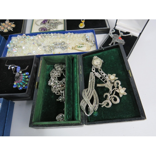 601 - Large selection of mainly silver toned costume jewellery.