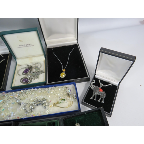 601 - Large selection of mainly silver toned costume jewellery.