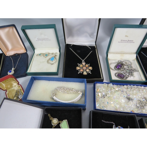 601 - Large selection of mainly silver toned costume jewellery.