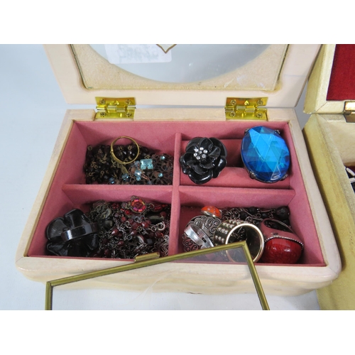 602 - 3 Jewellery boxes and costume jewellery contents.