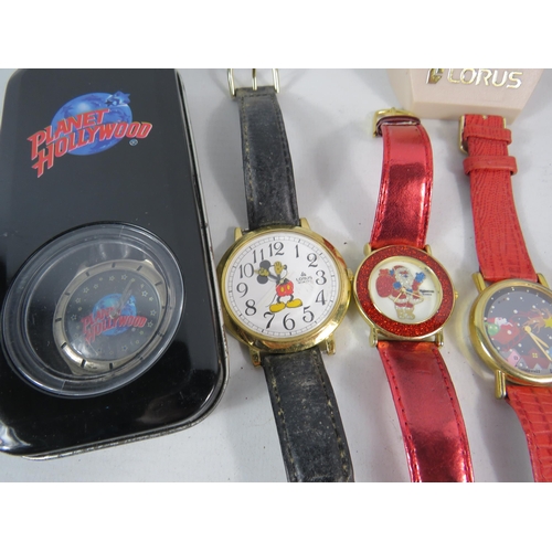 605 - Selection of Wristwatches, Disney, Christmas, Planet Hollywood etc.