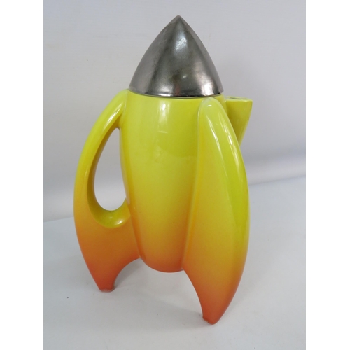 709 - Paul Cardew bright yellow and orange rocket ship teapot, possibly a second as unstamped (faults to t... 