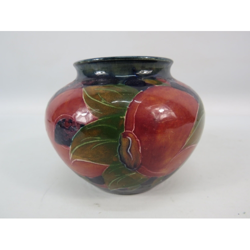 714 - Mid 20th century Moorcroft squat bulbous vase in the Pomegranate pattern signed to the base, 3.5