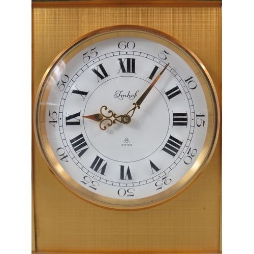 716 - Imhof Gilt heavy brass 15 jewel 8 day carriage clock in working order.