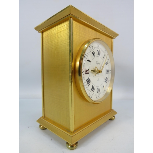 716 - Imhof Gilt heavy brass 15 jewel 8 day carriage clock in working order.