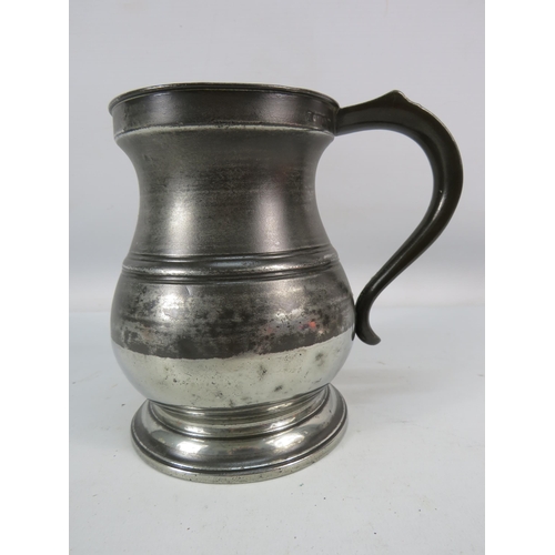 718 - English antique pewter bellied quart measure.