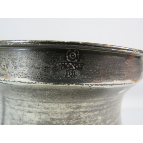 718 - English antique pewter bellied quart measure.