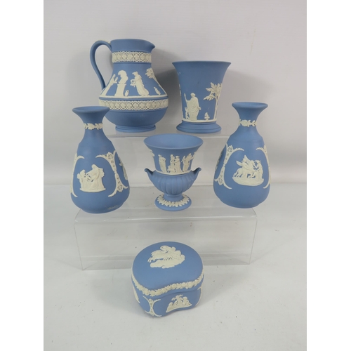 720 - Six pieces of Wedgwood light blue Jasperware.