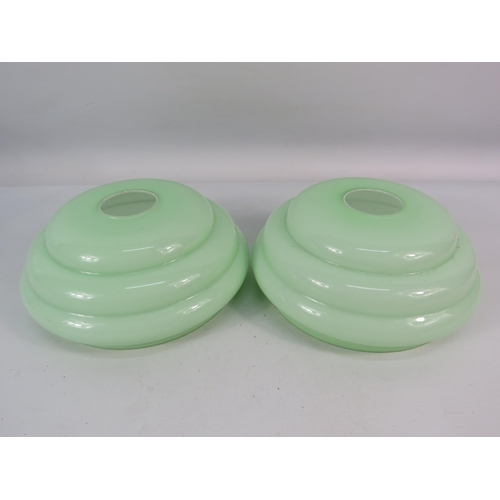 721 - Four art deco opaque green light shades.