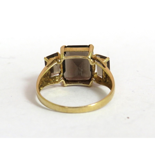 688 - 10ct Yellow Gold Ring set with Smokey Quartz . Finger size 'O'   2.4g