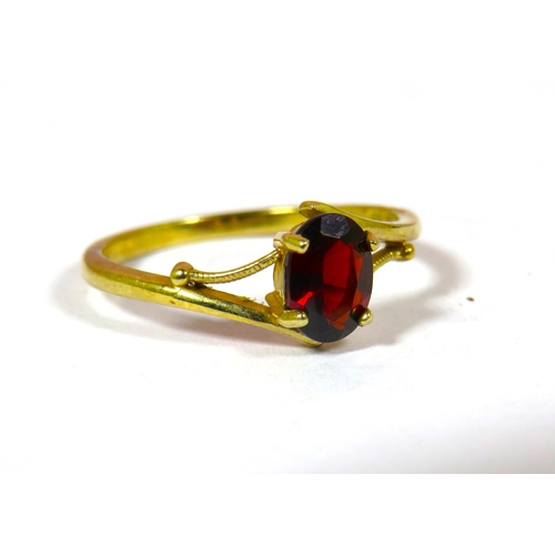 693 - 9ct Yellow Gold Oval Garnet set ring.  Finger size 'P-5'  1.8g