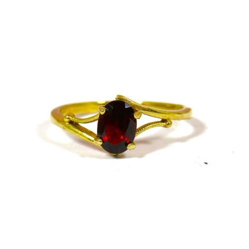 693 - 9ct Yellow Gold Oval Garnet set ring.  Finger size 'P-5'  1.8g