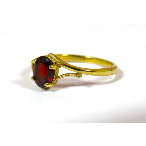 693 - 9ct Yellow Gold Oval Garnet set ring.  Finger size 'P-5'  1.8g