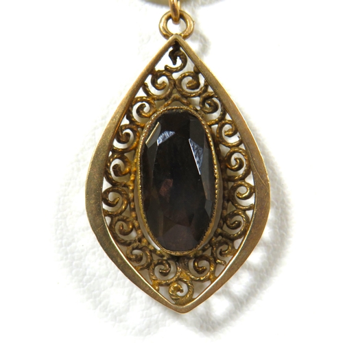 694 - 9ct Yellow Gold Garnet Set Pendant.  30mm long.  3.5g  (Chain not included)