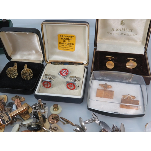 1195 - Large selection of vintage cuff links and tie clips.
