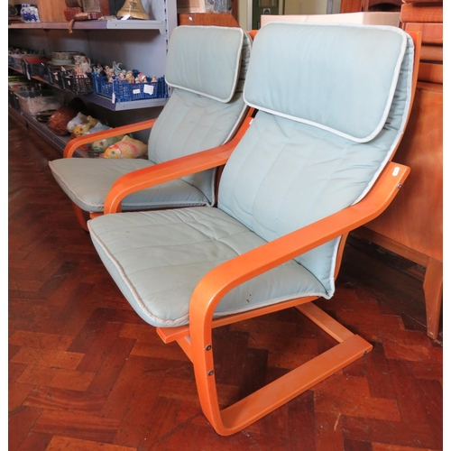 1558 - Pair of beech bent plywood retro lounge chairs, 38