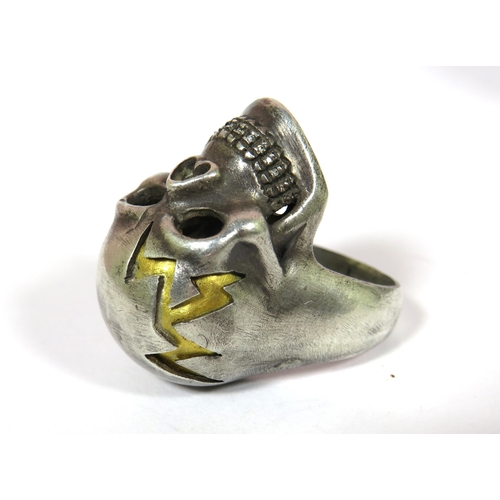 436 - New York Made, Oxidised Silver Skull ring set with Diamond Teeth plus a 24ct Yellow Gold Insert flas... 