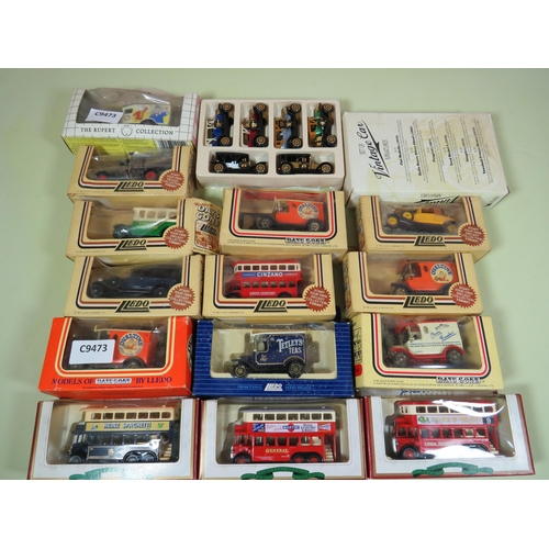 447 - Fourteen Die Cast Models of Trucks & Buses plus others. Some boxes a bit tatty. See photos.