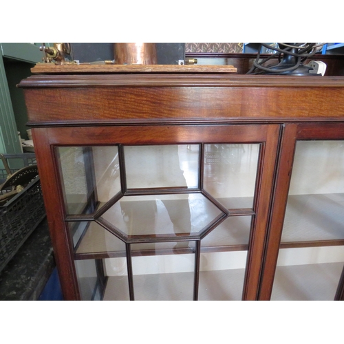 475 - Vintage double door display cabinet with claw and ball feet, three shelves. 52