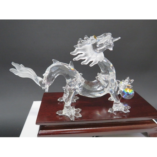 19 - Swarovski Crystal dragon, with a stand box and certificate.