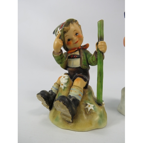 22 - Two Goebel hummel figurines, Mountaineer and Boy skier.