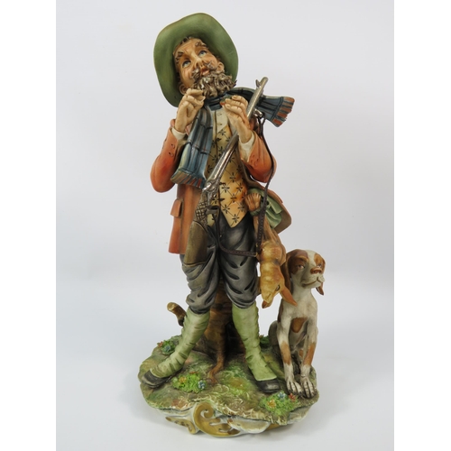 28 - Cortese Capodimonte figurine of a Hunter with his dog, 13