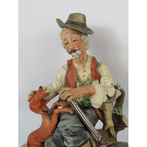 36 - A Giaretta Capodimonte game keeper figurine, 13