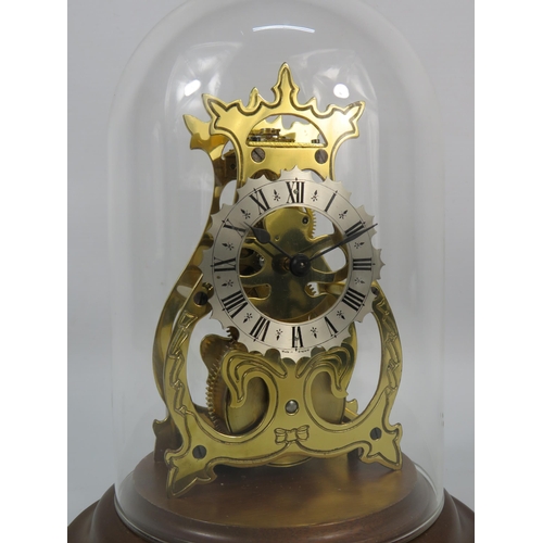 48 - English made anniversary clock with glass dome in running order with key.