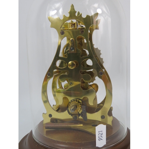 48 - English made anniversary clock with glass dome in running order with key.