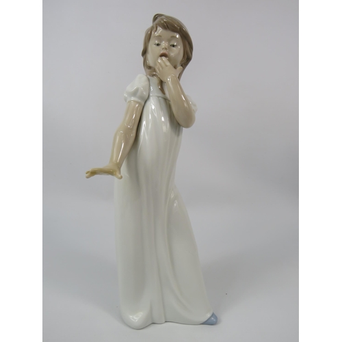 5 - Nao Lladro figurine of a girl yawning which stands 12