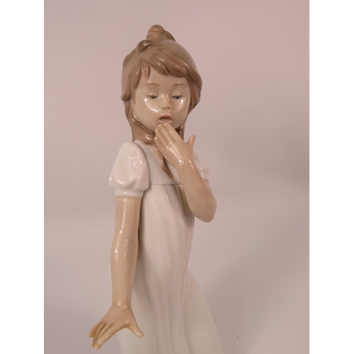 5 - Nao Lladro figurine of a girl yawning which stands 12