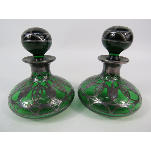 61 - Pair of Art Nouveau green glass with silver overlay scent bottles, 3.5