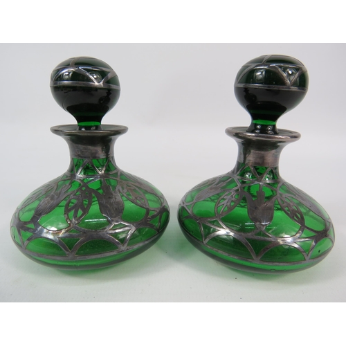 61 - Pair of Art Nouveau green glass with silver overlay scent bottles, 3.5