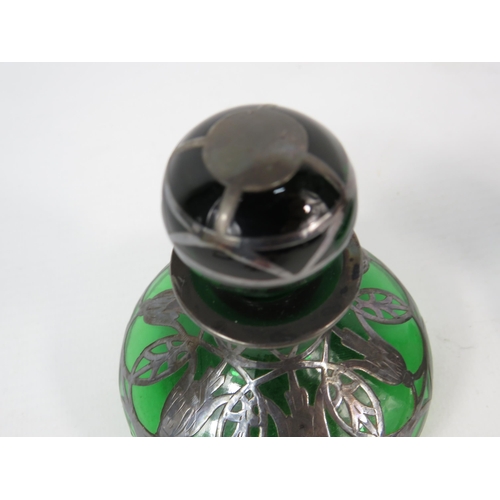 61 - Pair of Art Nouveau green glass with silver overlay scent bottles, 3.5