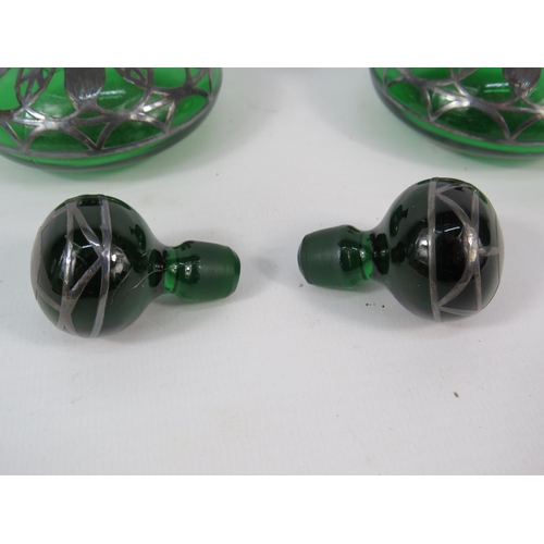 61 - Pair of Art Nouveau green glass with silver overlay scent bottles, 3.5