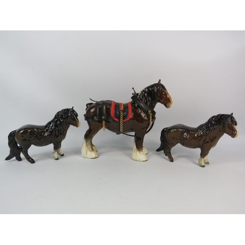 64 - Beswick shire horse and two shetland ponies.