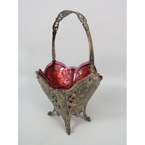 75 - Antique Continental 800 pierced silver basket decorated with cherubsand a cranberry glass insert, 9.... 