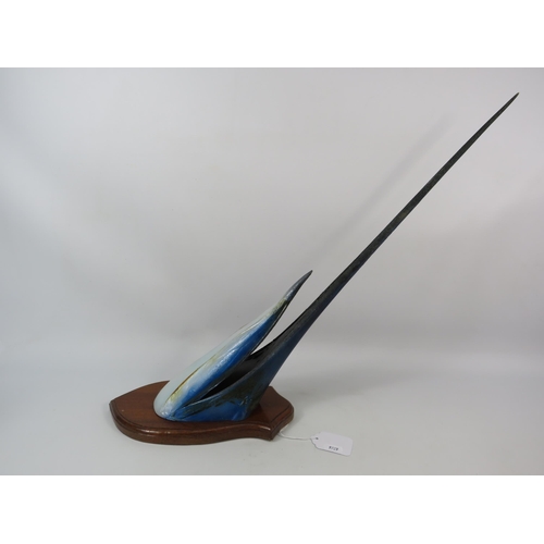 87 - Sailfish beak mounted on a wooden shield 21 3/4