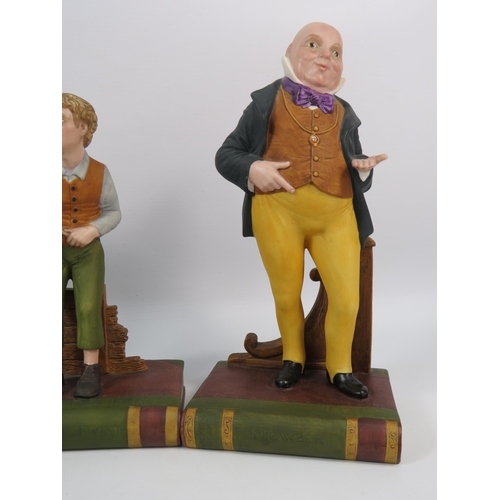 106 - Three Aynsley Oliver Twist figurines and a Mr McCawber, 9.5