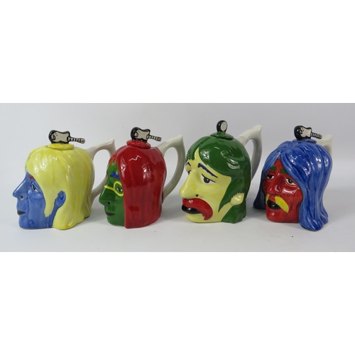 139 - Andy Warhol Themed psychodelic Beatles four colourway teapots, 5.5