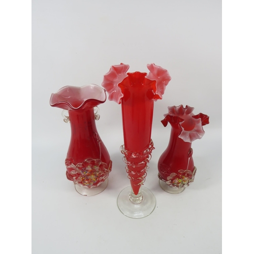 142 - Three vintage red Murano art glass ruffle top vases, the tallest stands 11.5