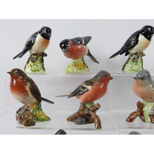 158 - Eleven Beswick bird figurines.