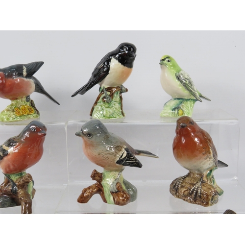 158 - Eleven Beswick bird figurines.