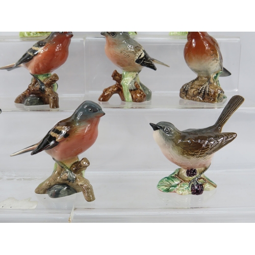 158 - Eleven Beswick bird figurines.