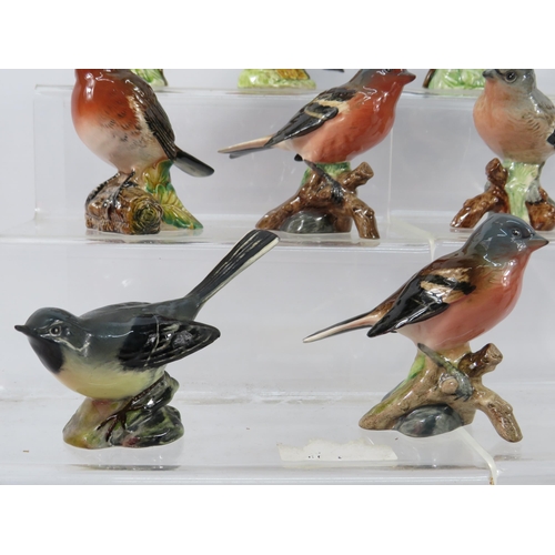 158 - Eleven Beswick bird figurines.