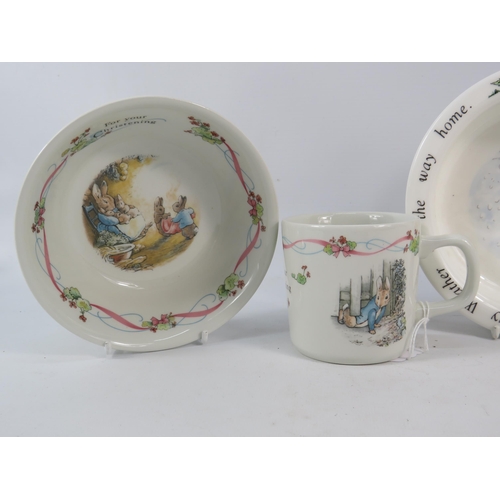 159 - Wedgwood and Royal Doulton Bowl and Cup Nursery sets, Peter Rabbit and Winnie the Pooh.