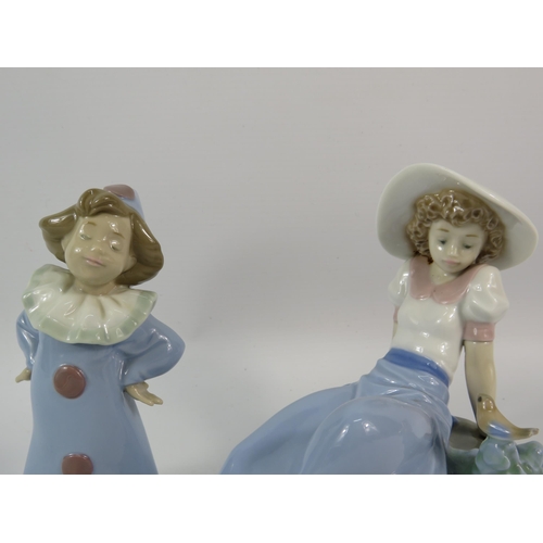 164 - Two Nao Lladro figurines, Girl sat with a bird and girl dressed as a clown.