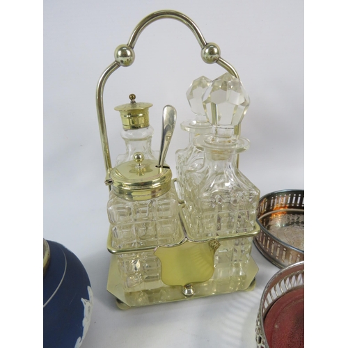 166 - Glass cruet set in lemon gilt stand, 3 wine bottle coasters and a Adams jasperware sugar bowl.